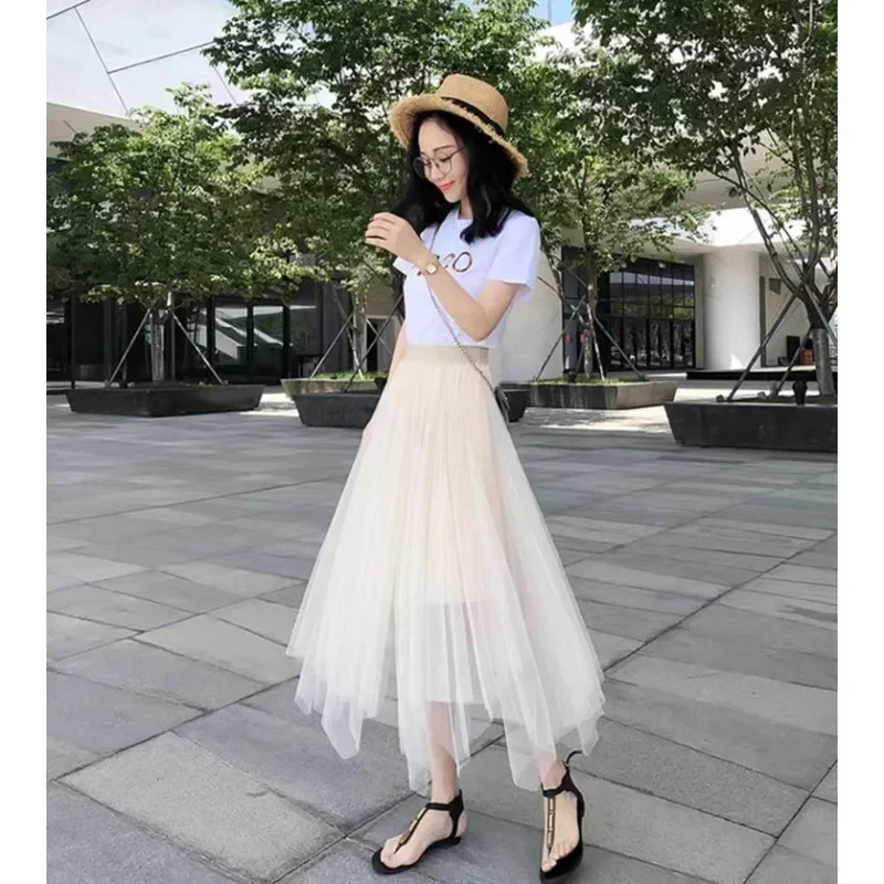 تنورة متوسطة الطول شفافة على شكل حرف A عالية الخصر - تنورة نسائية مكشكشة شبكية ذات طبقات غير متناظرة باللون الأسود