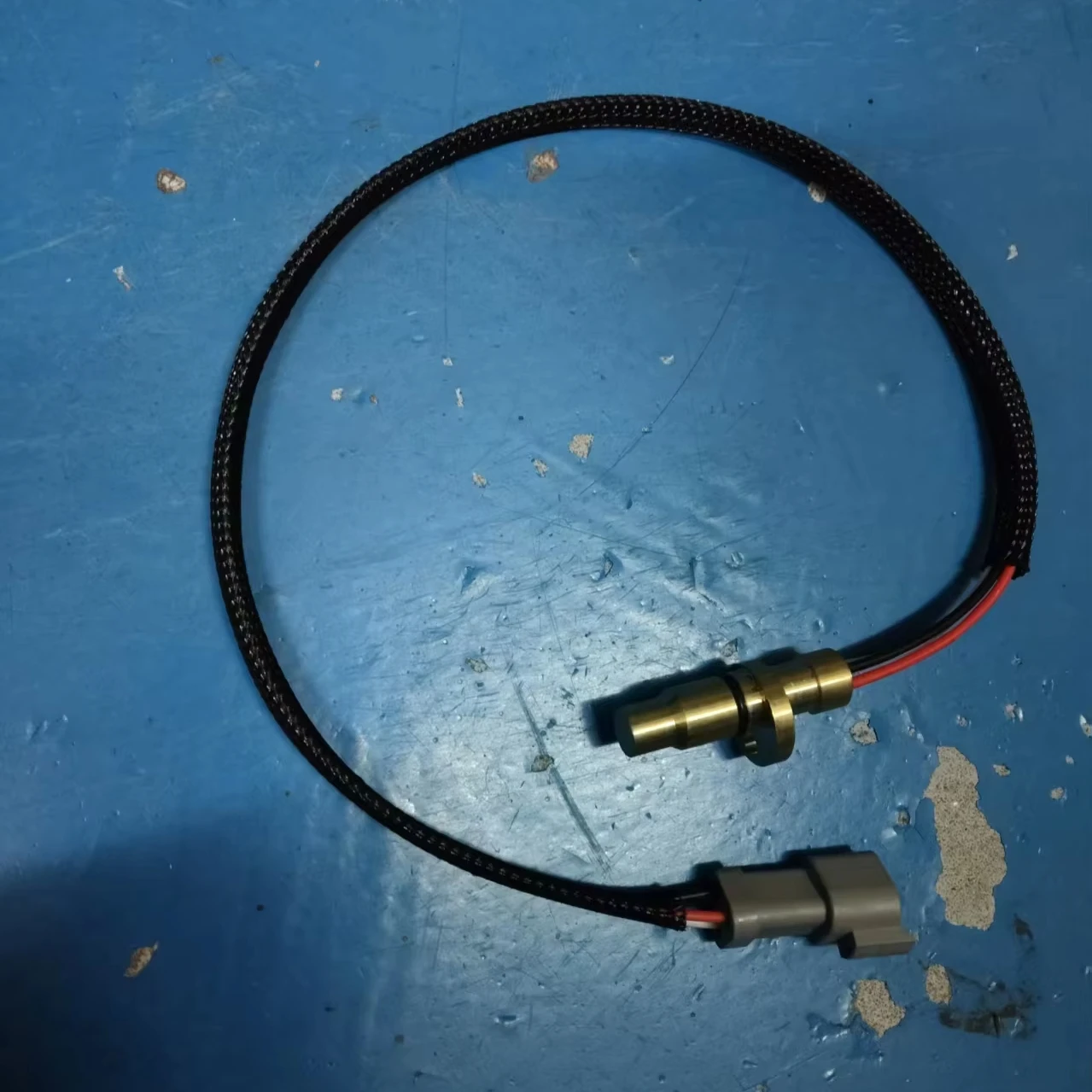 

Датчик скорости 11046847 AT360574 для John Deere 450J 450K 550J 650J 605C 605K 700J 850J