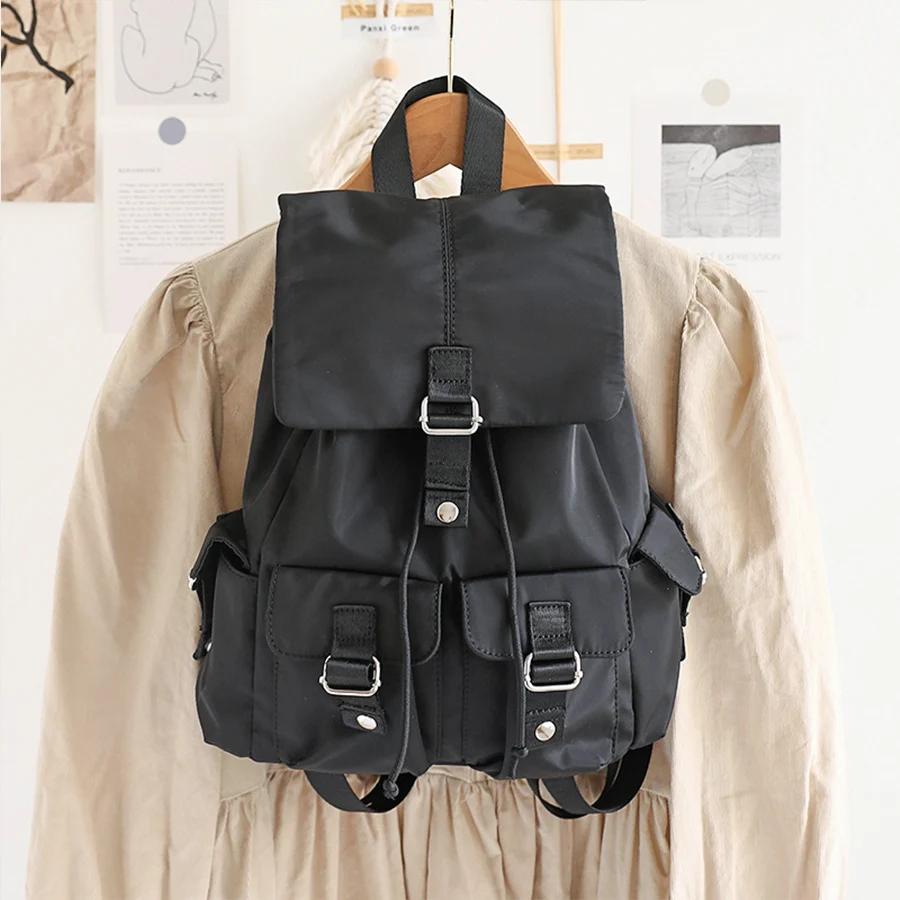 

Japanese lazy nylon cloth backpack female students schoolbag large capacity retro casual travel drawstring hasp shoulder daypack