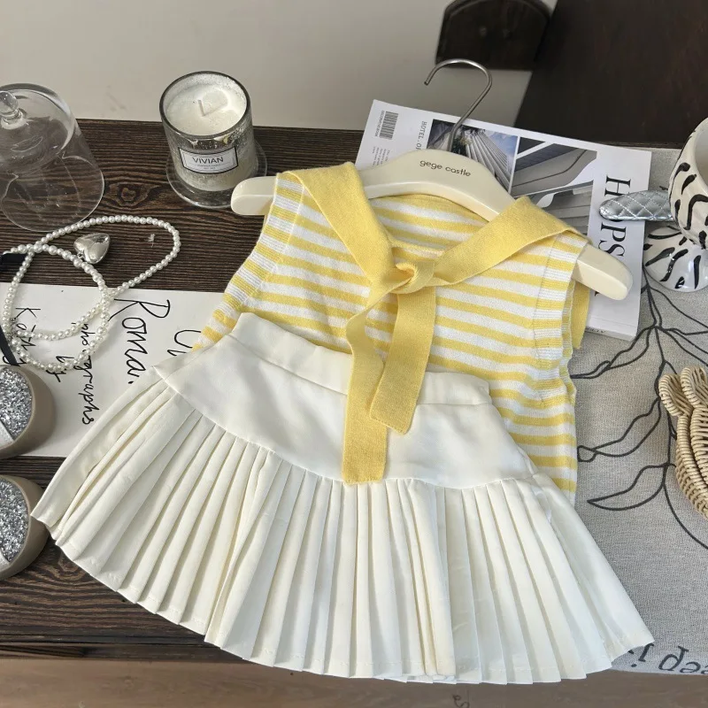

2025 New Summer Girls' Knitted Striped Shawl Vest and White Pleated Skirt Two-piece Set