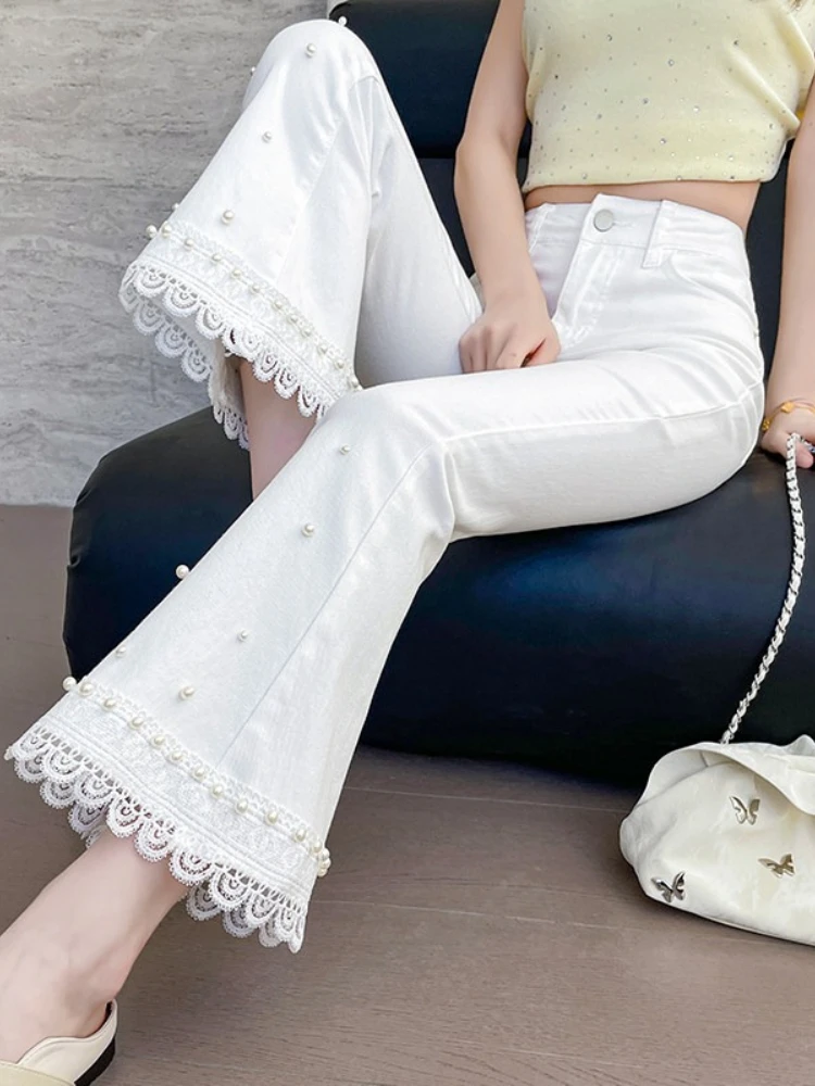 Nine point jeans women's lace splicing design 2025 autumn nail bead heavy industry high waist micro flared pants