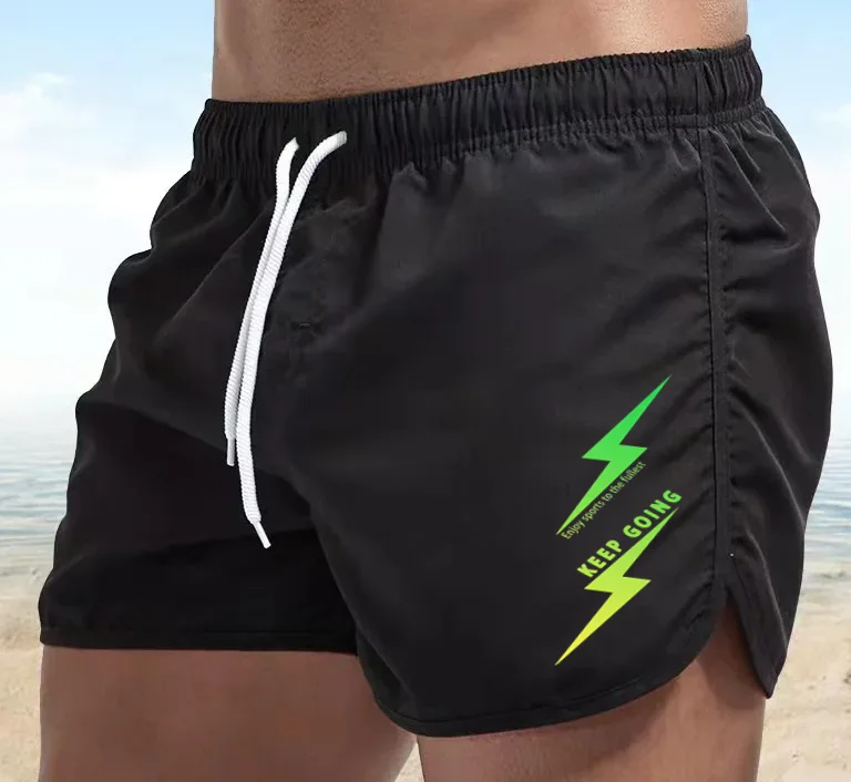 Men's lightning letter pattern quick drying sports shorts, elastic waist drawstring lightweight surfing pants