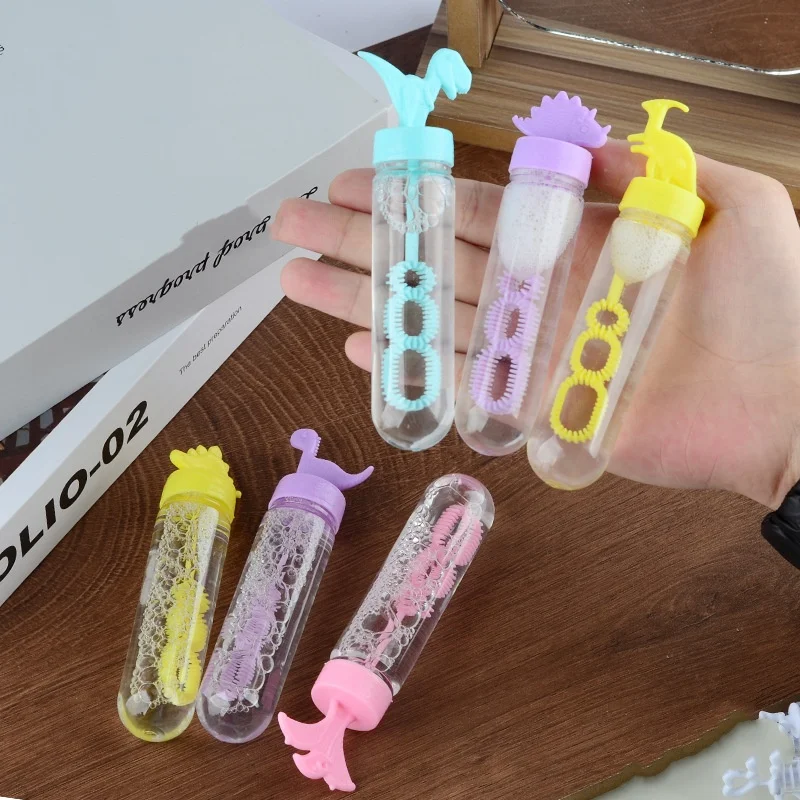 Botella de jabón de burbujas azul, rosa y verde, tubo de varita de dinosaurio, regalos de cumpleaños para invitados, decoraciones para fiesta de cumpleaños, juguete para bebé y niño, 5-10 Uds.