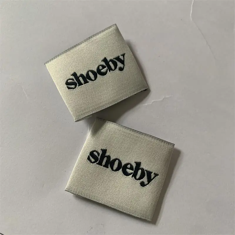 Factory Price Customized 3.5*3cm Creamy White Background Clothing Woven Labels