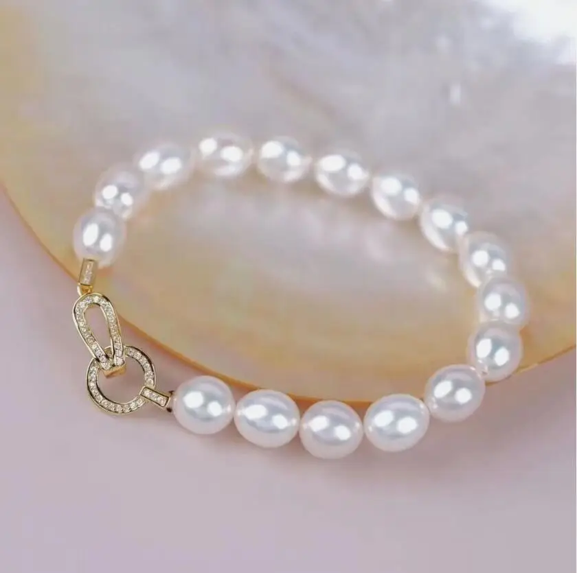 elegant 8-10mm south sea oval white pearl bracelet 7.5-8"925s