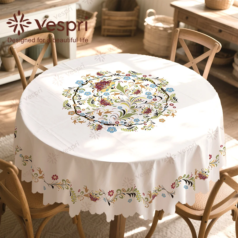 Vespri spring tablecloth, with white and beige decorations, featuring colorful flowers.