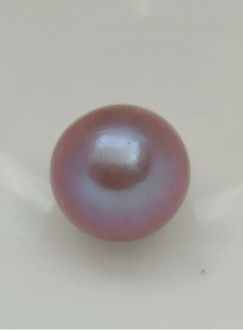 Top natural pink AAAA 12-13mm round true pine pearl Nanhai unclaimed.