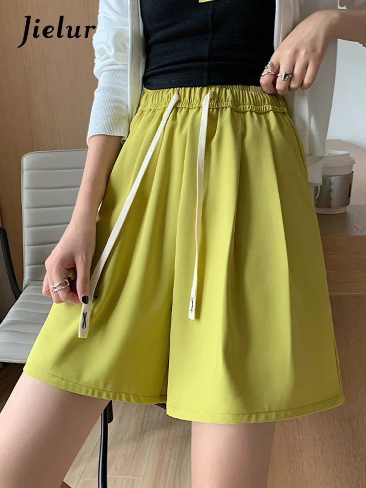 Jielur الصيف الرباط ضئيلة لون نقي السراويل النسائية عالية الخصر طول الركبة عارضة الشارع الشهير جيوب أسود أصفر فاتح السراويل