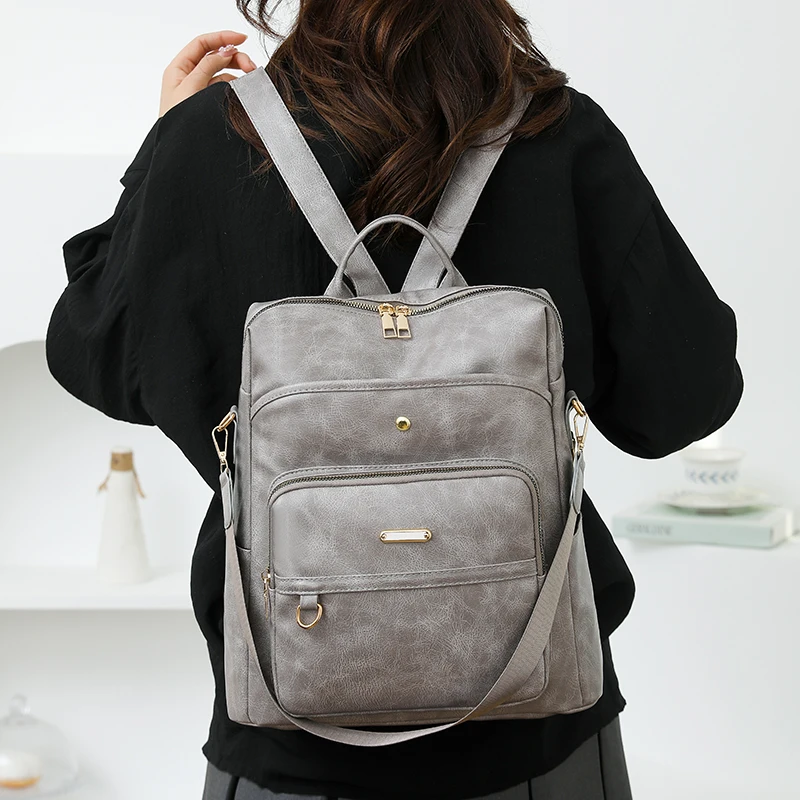 حقيبة ظهر نسائية عصرية من البولي يوريثان بسيطة بلون سادة وقابلة للتحويل للسفر مع حقيبة كتف كاجوال متعددة الاستخدامات بسعة كبيرة