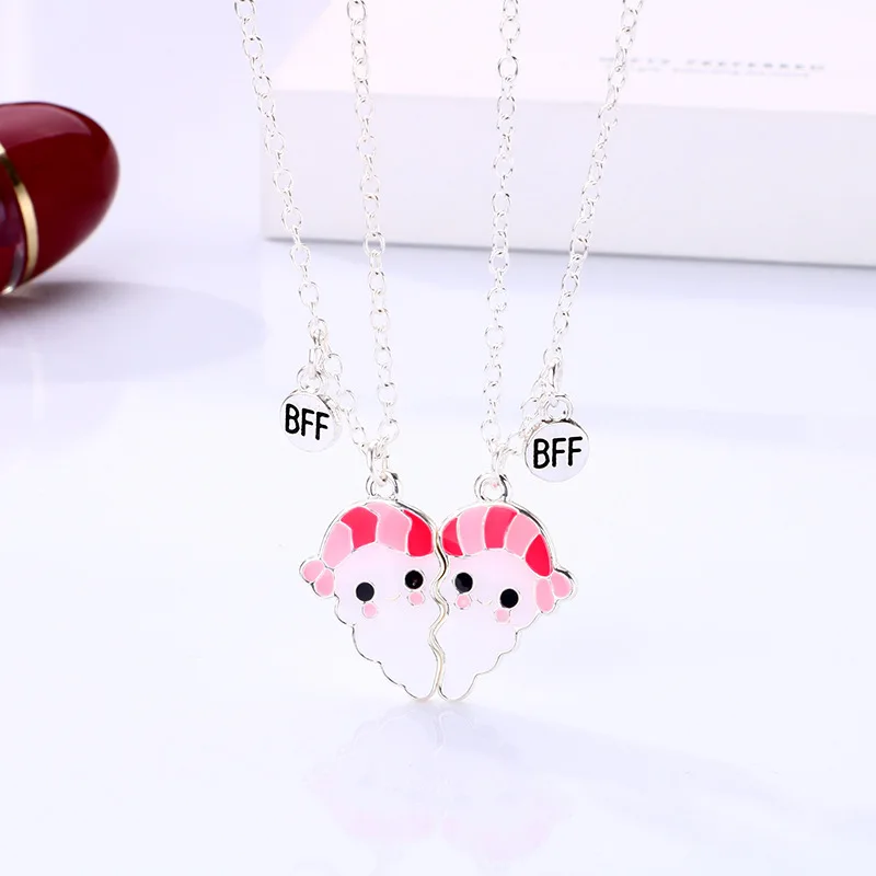 Fashion new hot selling magnet phase suck cartoon little man alloy drip oil pendant BFF friends children's necklace wholesale