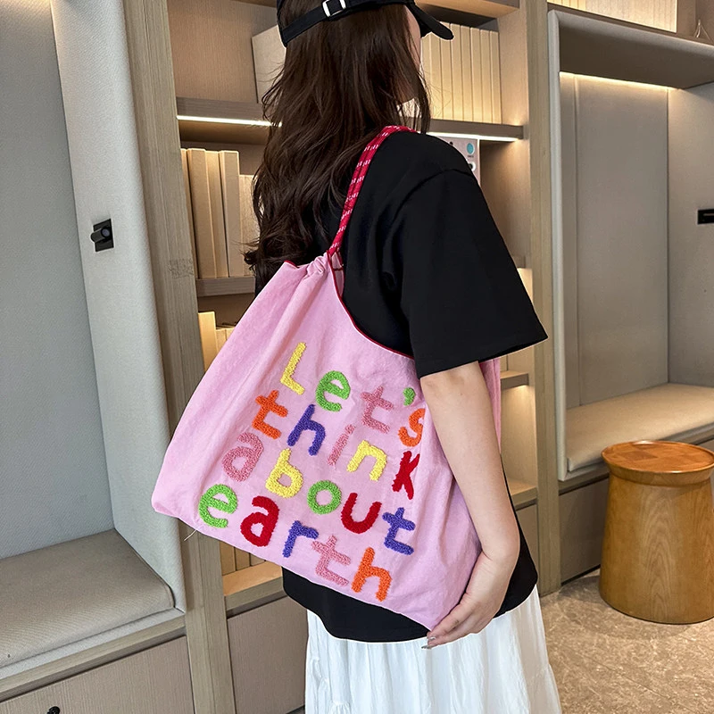 

Korean StyleinsLarge-capacity tote bag, casual style, letter-embroidered canvas shoulder bag, women's portable shopping bag