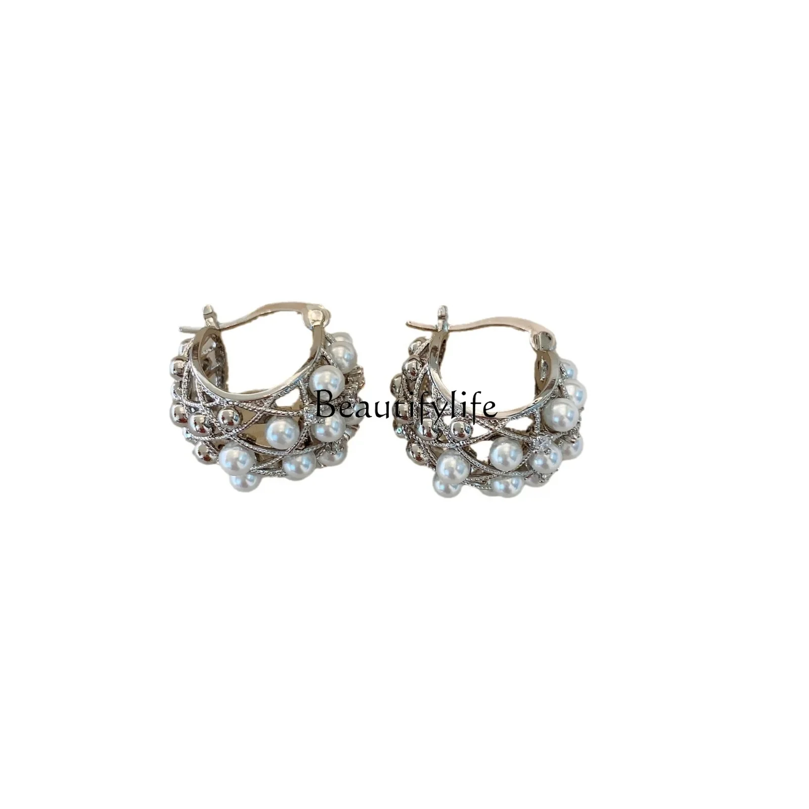 

Temperament hollow pearl earrings, high-end, unique earrings