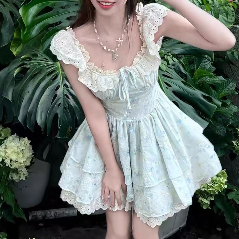 YENKYE Süßes Mädchen Spitze Gespleißt Blumendruck Tank Sommerkleid Frauen Niedrige Taille Rüschensaum A-Linie Minikleid Hübsche Dame Sommerkleid