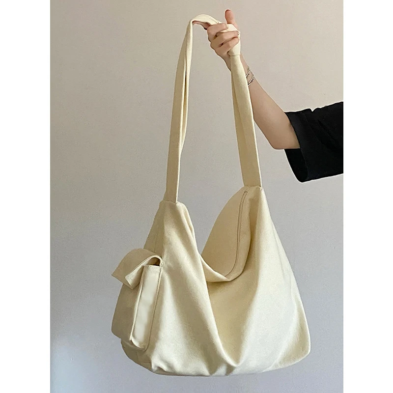 

Workwear-style canvas bag, large capacity, laid-back style, solid color versatile, single-shoulder crossbody canvas bag