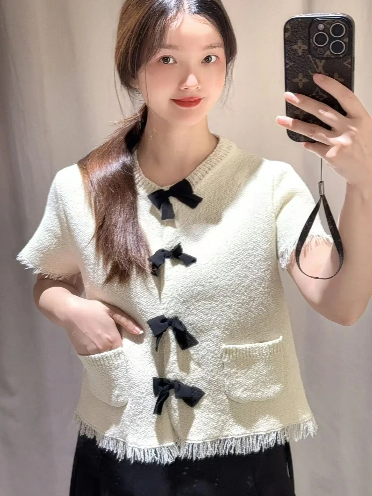 ربيع وصيف جديد وصول المرأة محبوك ort Sve معطف عقدة مزين الحلو Sle فضفاضة تناسب ألياف البوليستر