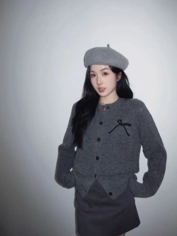 Cárdigan de punto retro para mujer, suéter con lazo tridimensional de atmósfera de invierno 2025