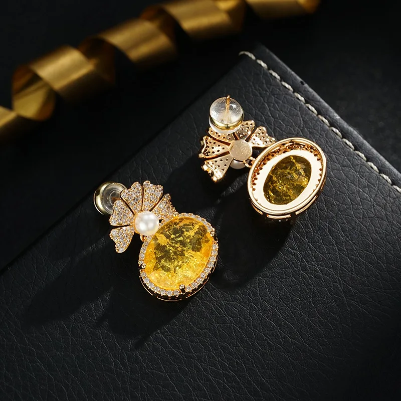 Light luxury fashion geometric oval zircon flower leaf earrings European and American micro-paved zircon earrings niche jewelry