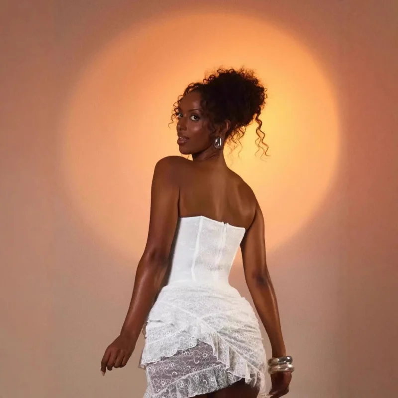 Conjunto de falda ajustada de encaje con tirantes de espina de pescado elegante a la moda europea y americana para mujer nuevo