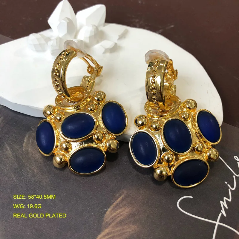 

European and American retro blue mask ear clip earrings