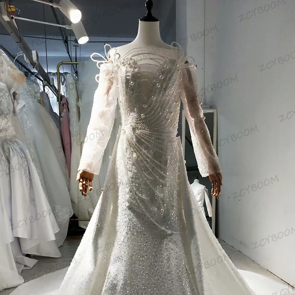 Luksusowe białe suknie ślubne 2 w 1 w stylu syreny z odpinanym trenem, zdobione perłami i koralikami, satynowe suknie ślubne z długimi rękawami dla kobiet, kolekcja 2025.