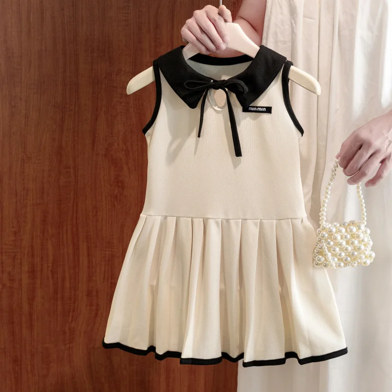 

Summer girls' pleated skirt with turn-down collar and tank top design.Tong Hepburn style princess dress