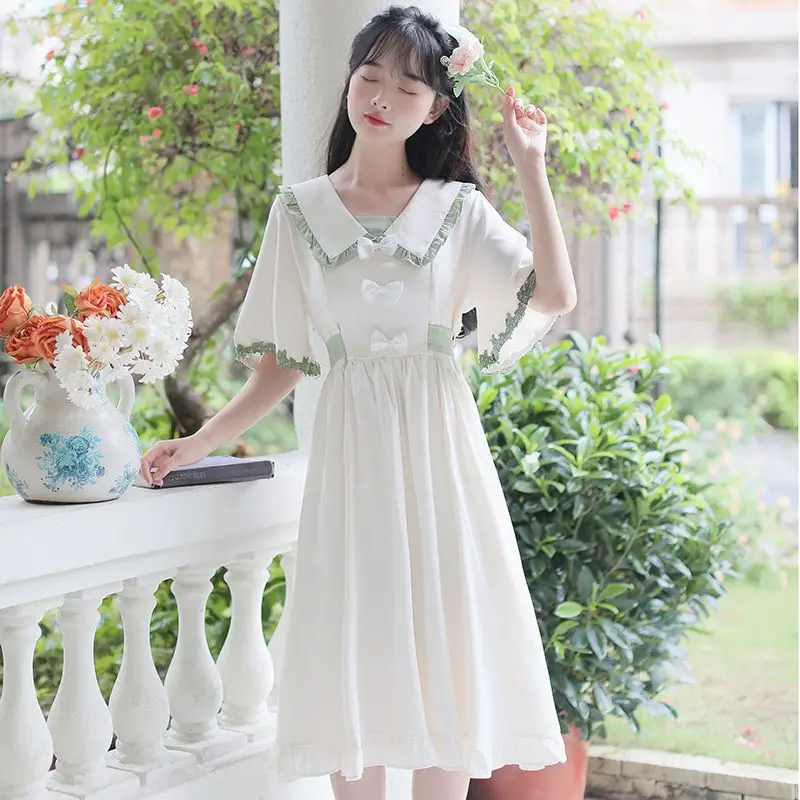 Sweet Peter Pan Collar Bandage Folds Bow Princess Dress Female Clothing 2024 Summer New Loose All-match Flare Sleeve Midi Dress