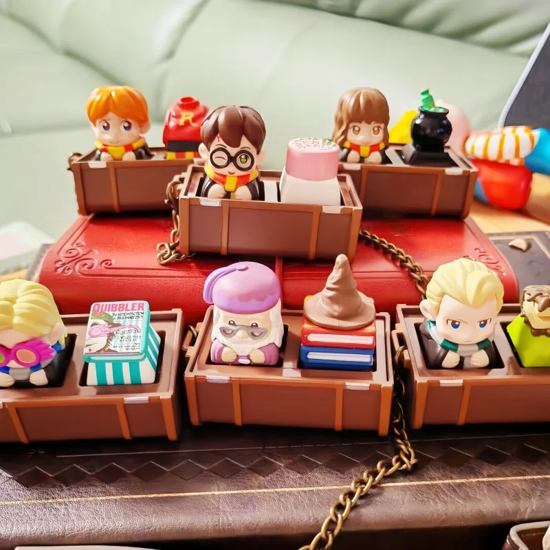 Caliente nuevo genuino de la marca compartida Harry Potter nueva serie Time-Turner Keycap caja sorpresa colgante adorno periférico regalo práctico