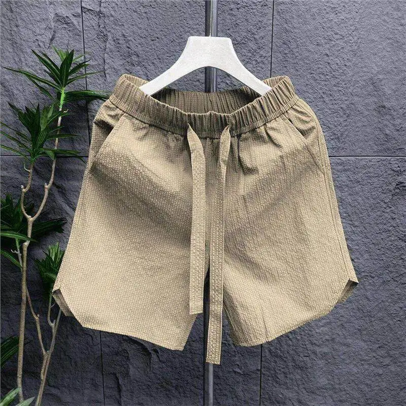 

Summer 2026 Men's Loose Fit Five Inch Work Shorts Quick Dry Beachwear Polyester Fiber Elastic Waist Straight Leg Casual Shorts