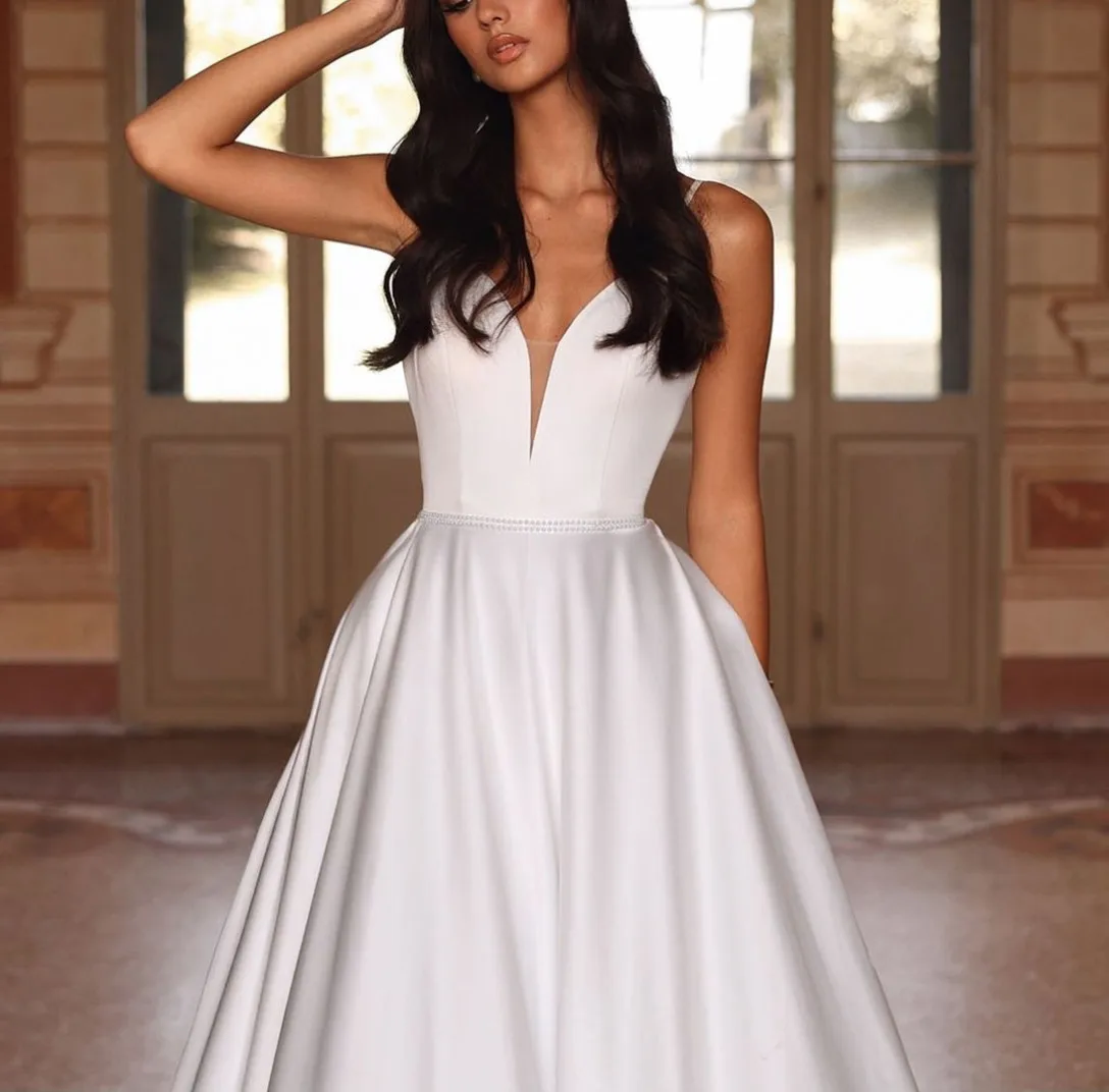 Customized Long Satin V-Neck Wedding Dresses with Pockets A-Line Sweep Train Lace Up Back Bridal Gowns for Women