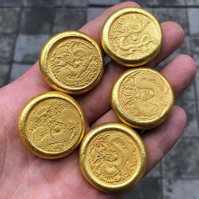 A set of five antique brass ancient coins and copper five emperors ingots