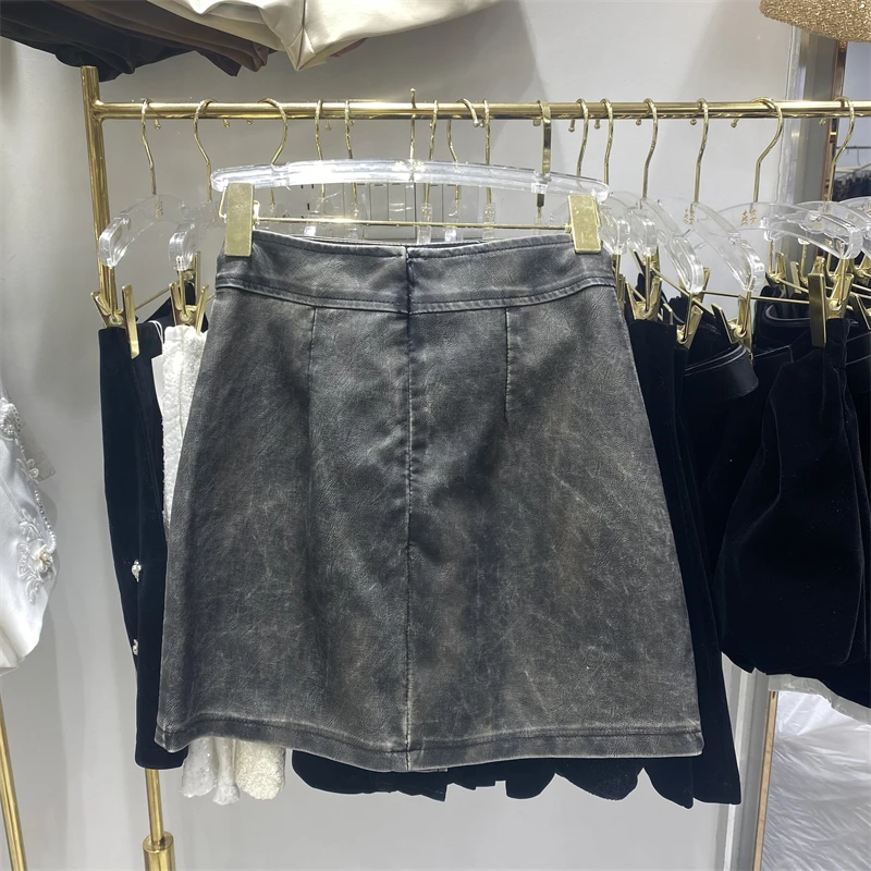 تنورة نصف جلد PU بمزاج متطور لخريف المرأة، تنورة قصيرة جديدة للفتيات الحارة بتصميم عتيق عالي الخصر على شكل حرف a #3