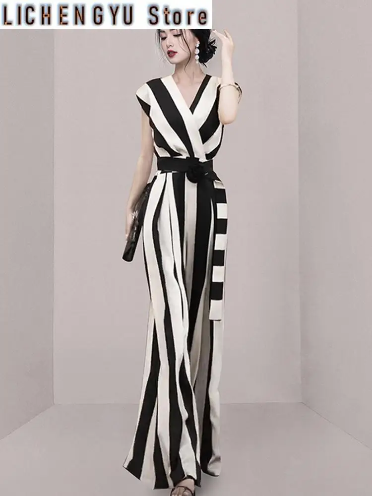 

New Summer Female Fashion Clothes Sexy V-Neck Sleeveless Jumpsuits With Belt Women Slim Stripe Wide Leg Jumpsuit