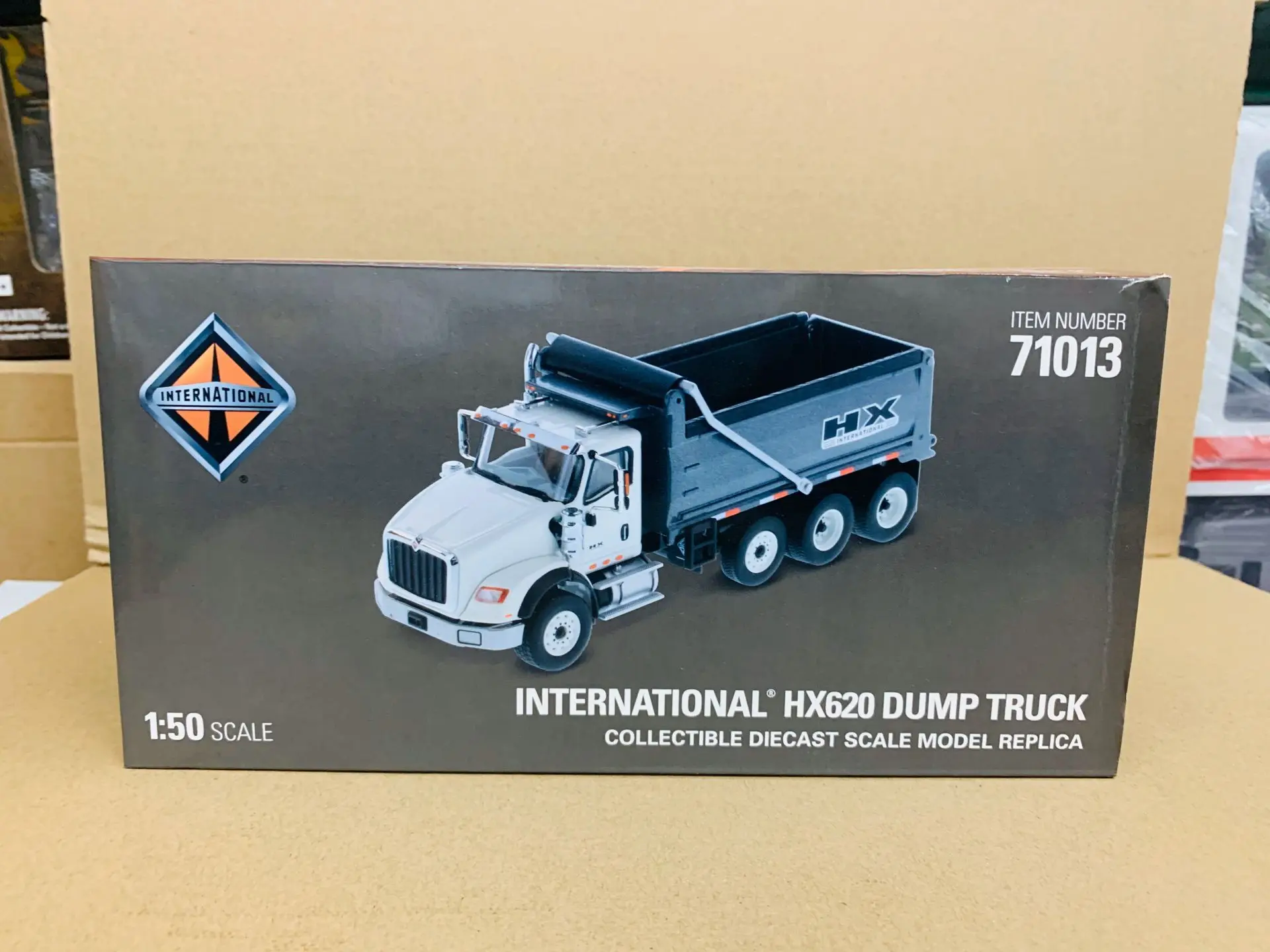 INTERNATIONAL HX620 DUMP TRUCK WHITE 1:50 SCALE DIECAST BY DIECAST MASTERS 71013