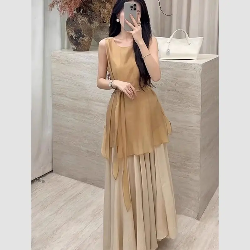 Nuevo conjunto pequeño y fragante de lujo de dos piezas para mujer, moda de verano, blusa sin mangas con cordones, Top + falda larga acampanada, traje elegante