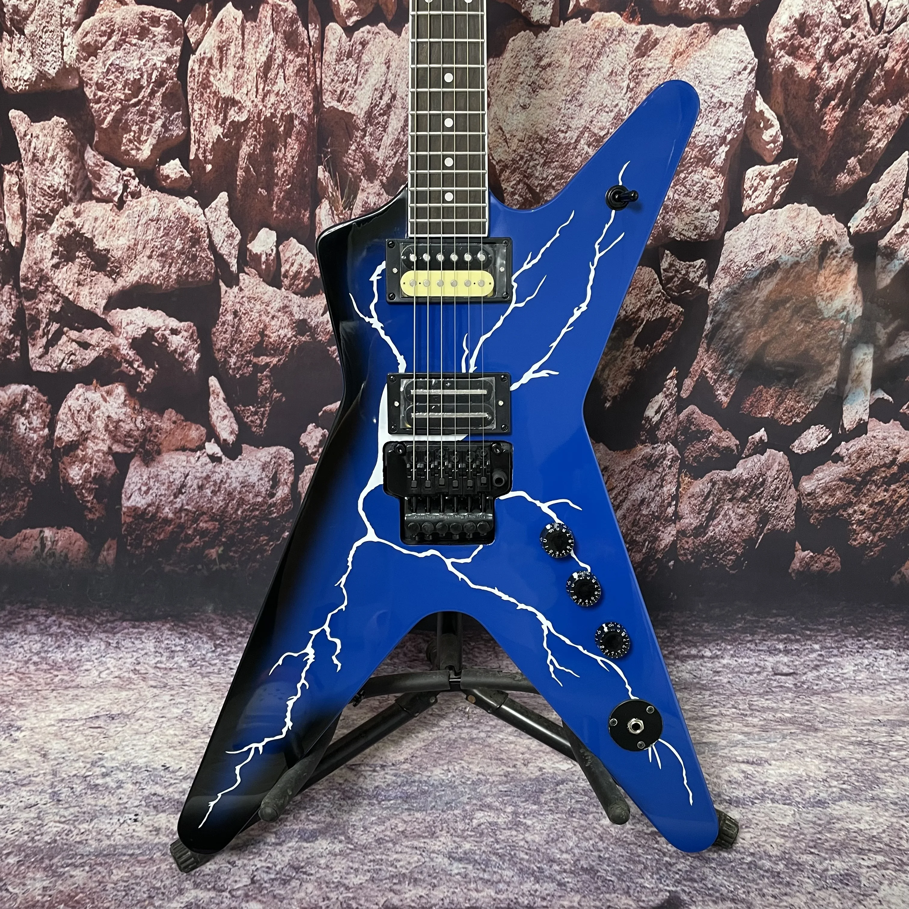 Chinese electric guitar, dark blue color, with white lightning pattern, tremolo system, excellent sound quality, highly popular