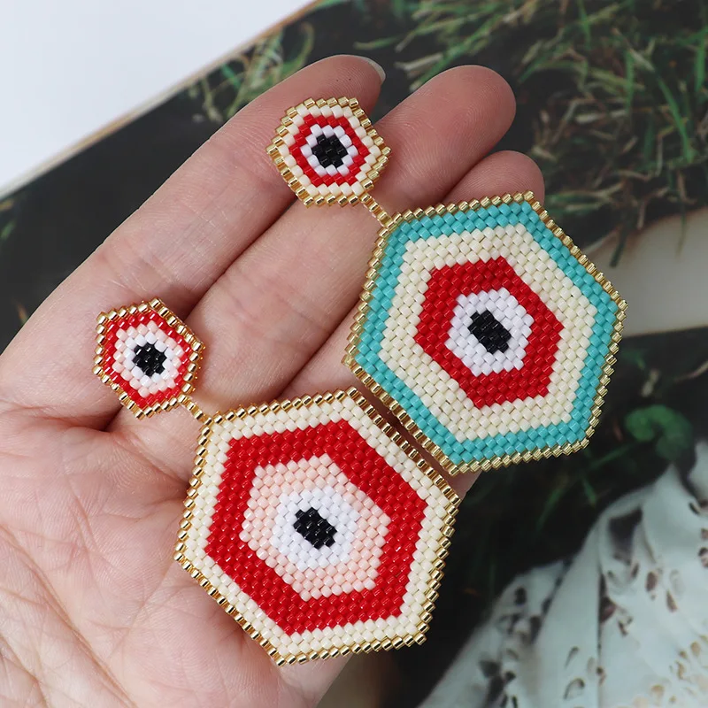 

Rice bead earrings Hexagon Devil's eye Design Originality Hand knitting Bohemia Alloy Fashion Simple Beaded earrings