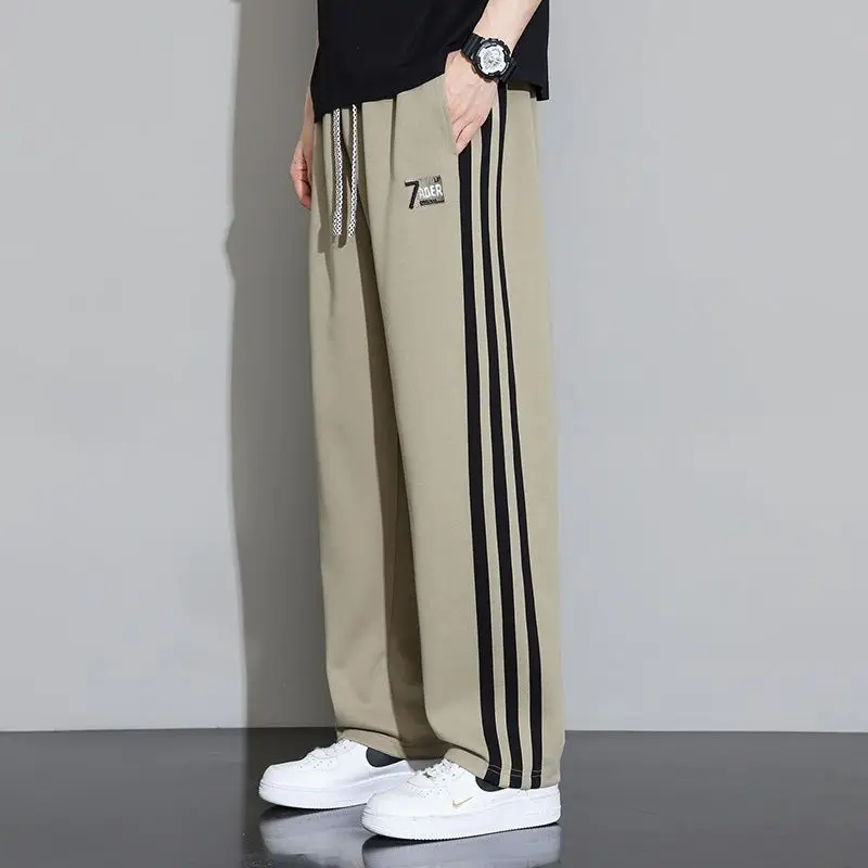 メンズ秋冬スタイルストライプ対照的な色ルーズ多用途カジュアルパンツストレートパンツプラスベルベット肥厚