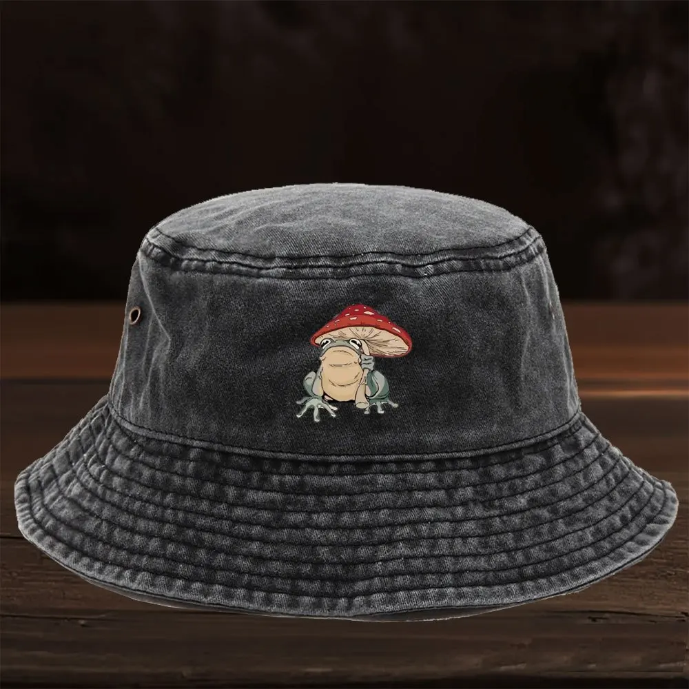 A Limited Edition Washed Fisherman Hat Featuring a Cartoon Frog Print Design, in a European And American Style. It'S Lightweight