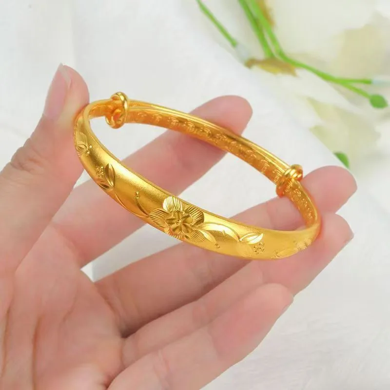 Luxurious 24K 9999 pure gold bracelet, adorned with carved flowers, featuring an adjustable clasp