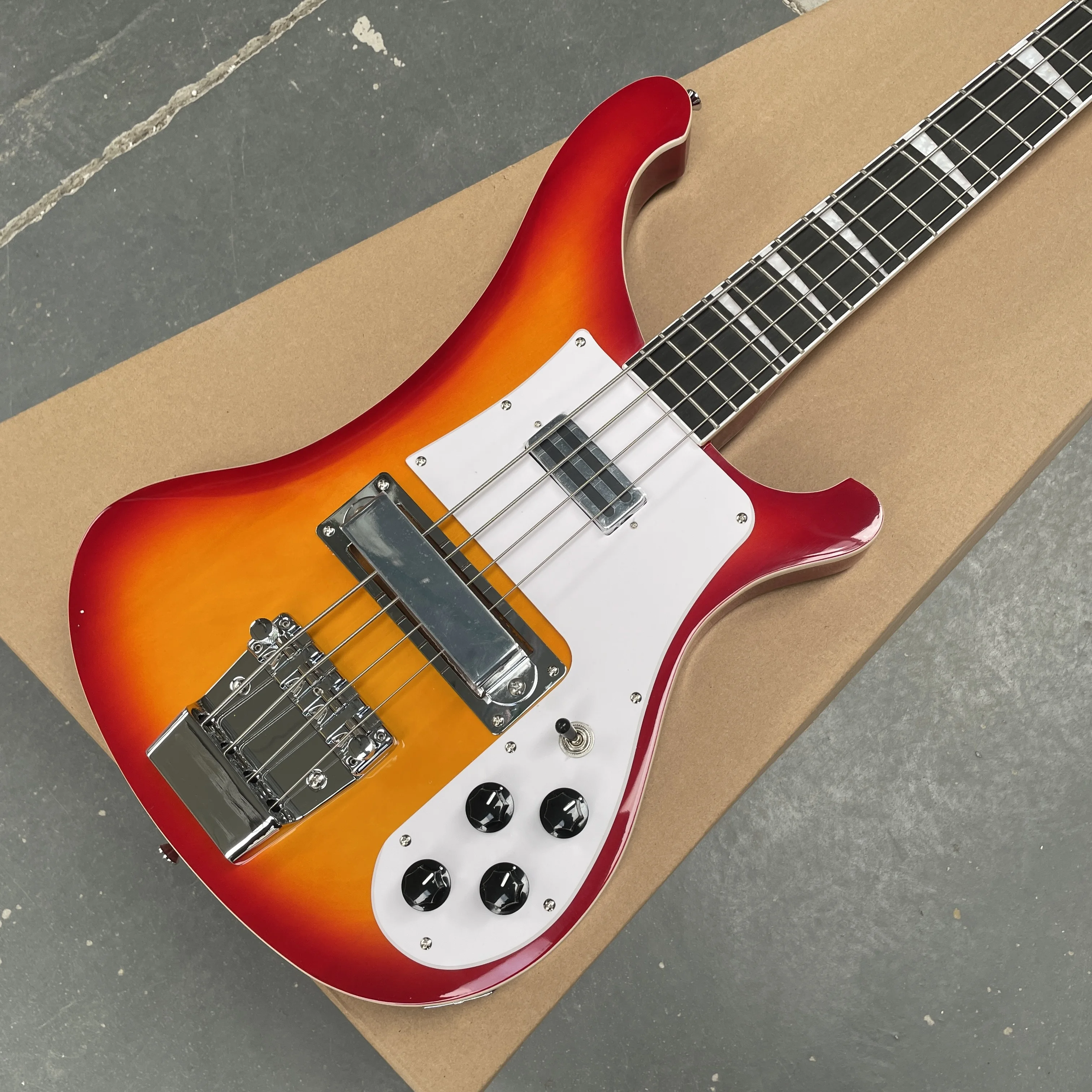 

4-string vintage electric bass guitar, sunset gradient double pickup guitars, high appearance level rock bass electric guitarra