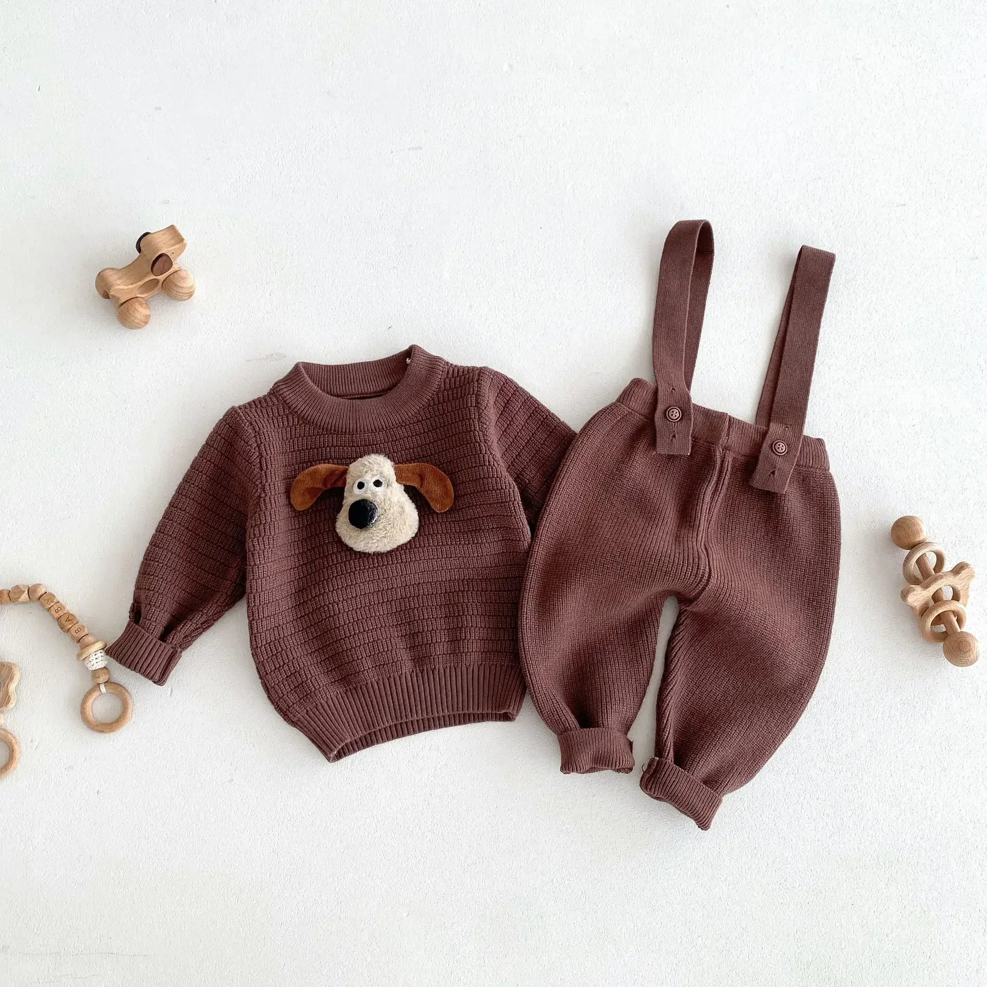 

Korean version of autumn and winter new children's clothing infant children solid color three-dimensional dog head long-sleeved