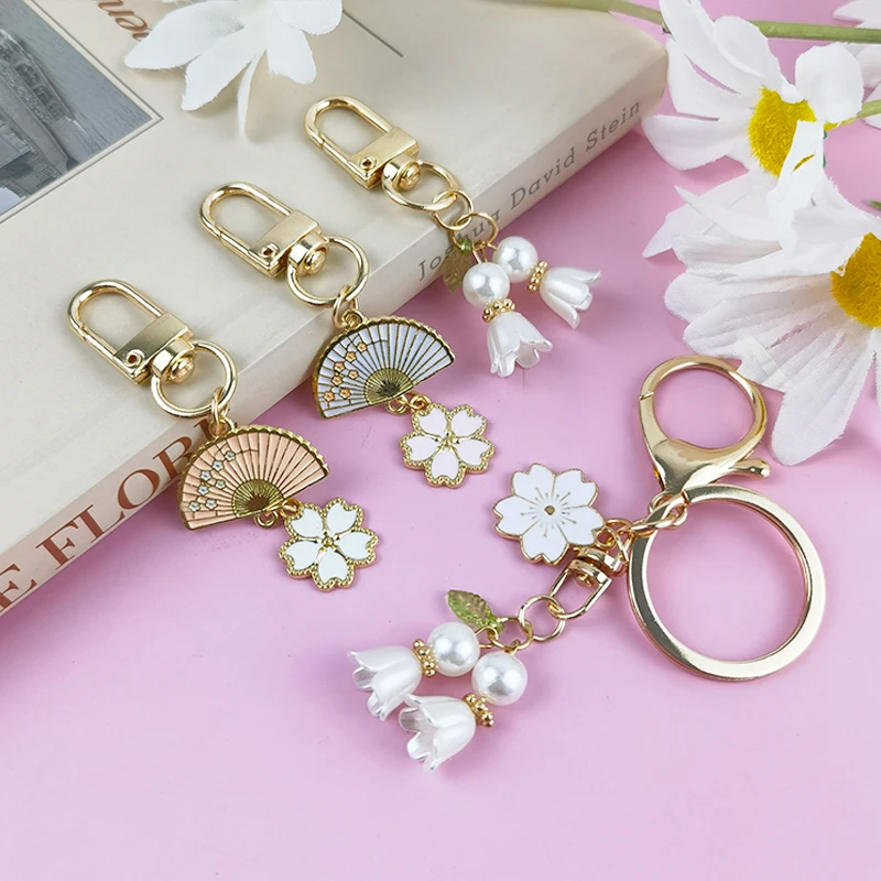 Elegant Pink Lily Of The Valley Keychain Fashion Fan Flower Pendant Key Ring Earphone Case Holder Wallet Charm Key Accessories