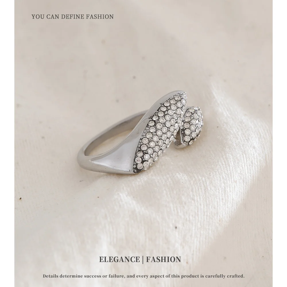 NiNice خاتم الفولاذ المقاوم للصدأ برأسين الزركون شخصية نمط تصميم الأزياء والمجوهرات هدية بالجملة