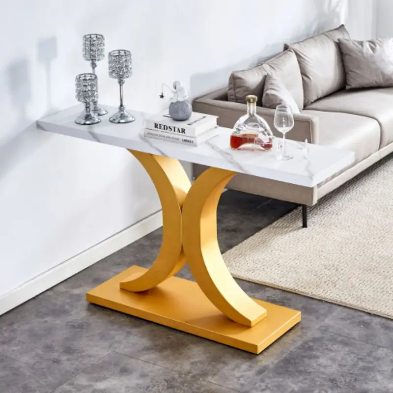 A modern minimalist style foyer table with white tabletop, gold bracket, and bottom plate, enhancing the beauty