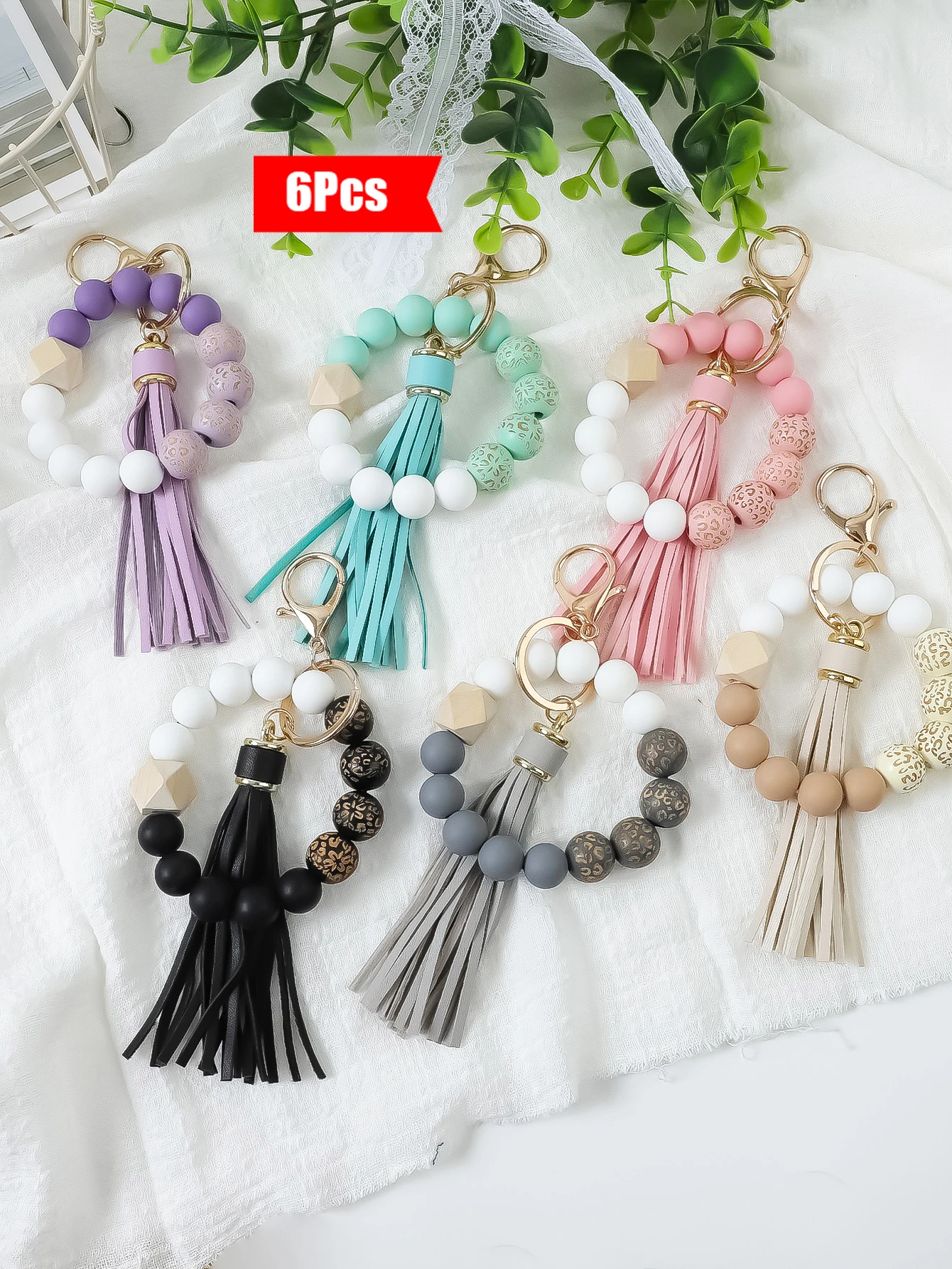 6-piece set of printed carved wooden beads, silicone bead beads, PU tassel charm wrist keychain suitable for bag decoration, car