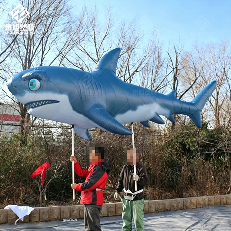 

Customized hand-held inflatable shark model, suitable for parades and ocean themed events, advertising decoration props