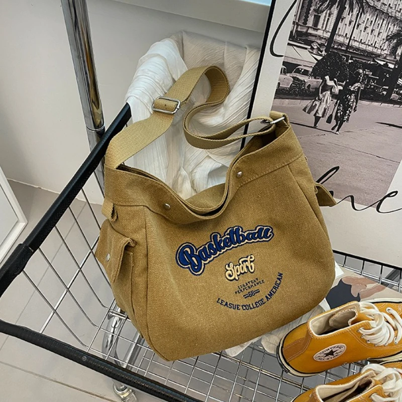 2025 Nuova borsa a tracolla in stile coreano: borsa in tela con stampa di lettere, spaziosa e leggera, perfetta per la scuola, il lavoro e lo shopping