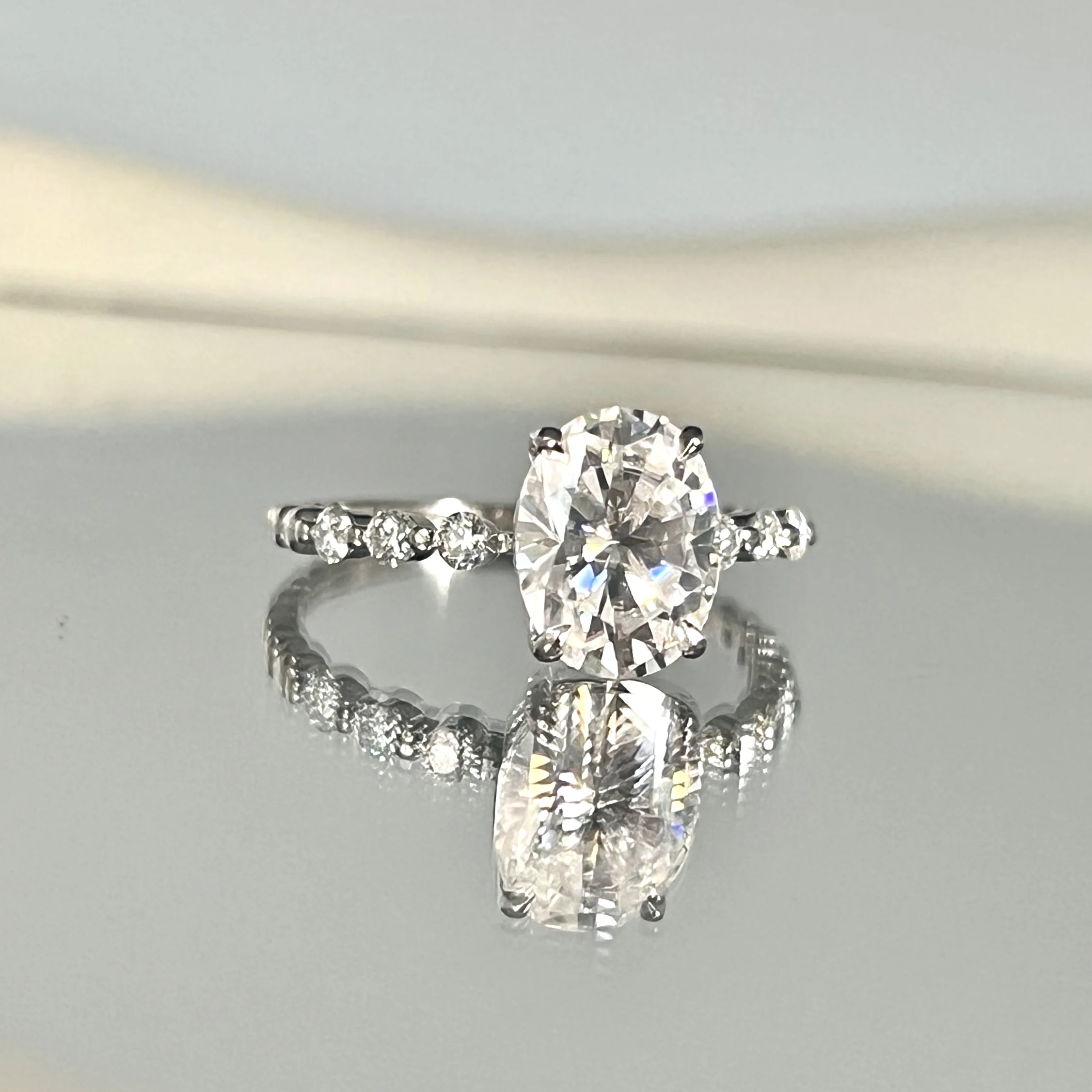 

2-carat pigeon’s egg moissanite, S925 sterling silver with 18K thick gold plating. Moissanite women’s ring.