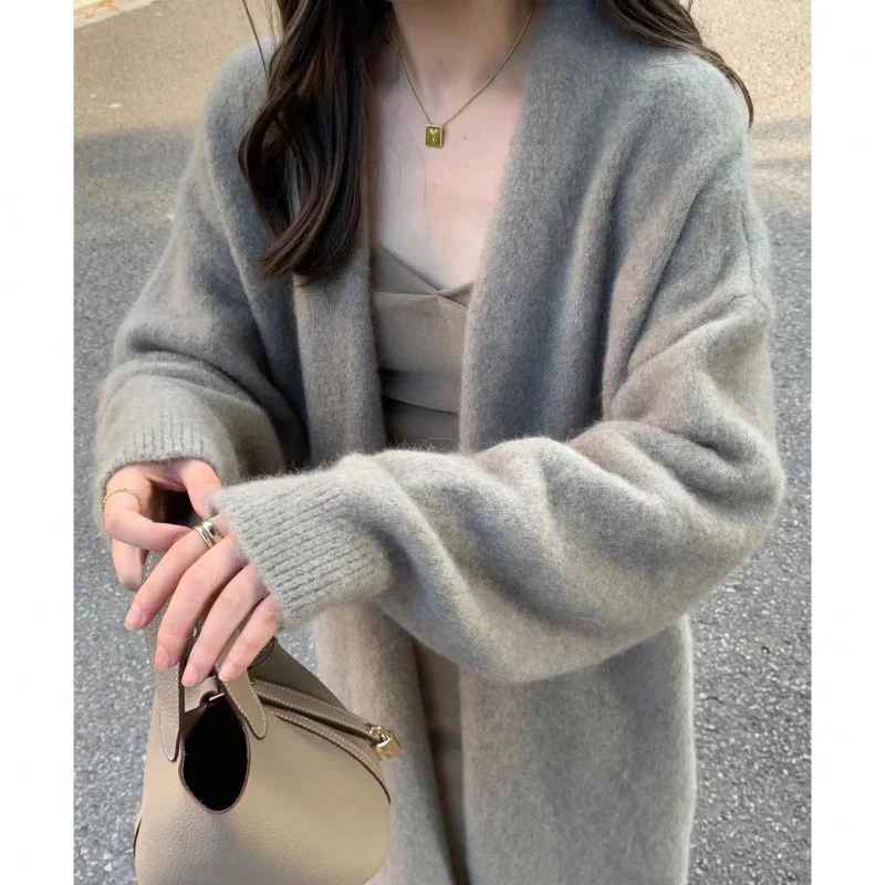 

Удлиненные кардиганы в японском стиле оверсайз для женщин: зимние, минималистичные, с полувысоким воротником, в горошек, с объемными рукавами, вертикальными стразами, винтажные