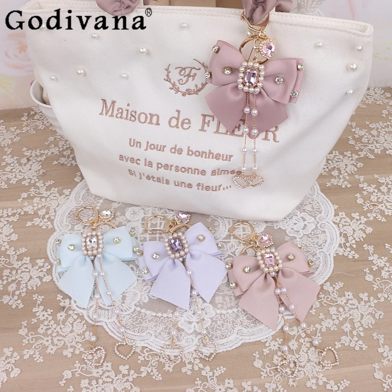 

Оригинальные аксессуары ручной работы в японском стиле Лолиты, жемчужная цепочка со стразами и бантом, сумка для телефона, подвеска, брелок